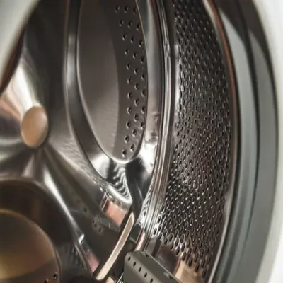 Foto del interior de un tambor de lavadora simbolizando la reparación de lavadora Whirlpool en CDMX
